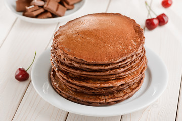 Huge pile of ruddy pancakes