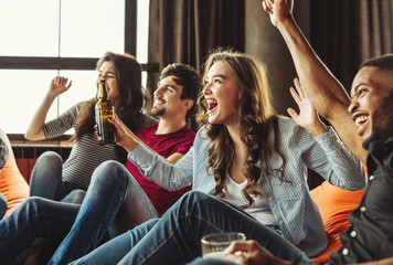 Happy friends football fans