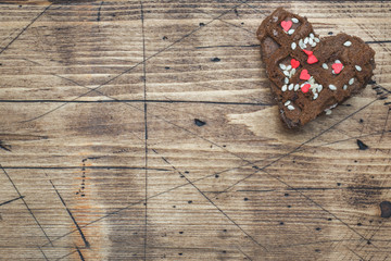 Concept Valentine's Day. Chocolate chip cookies on a wooden table. Greeting card. Copy space