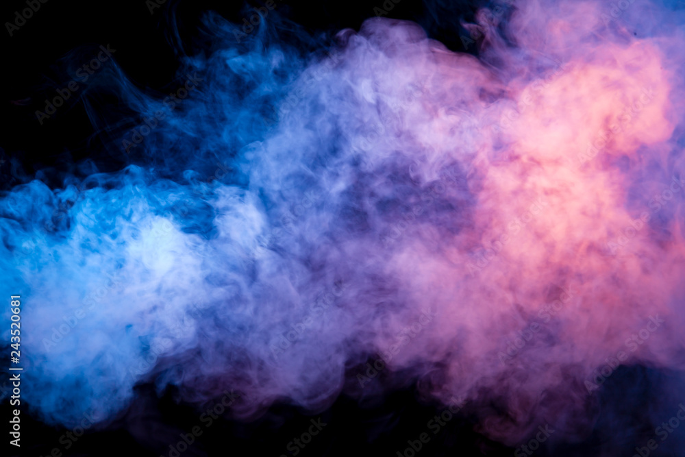 Wall mural multicolored smoke from a vape of blue and purple color of the strange mystical form on on a black i