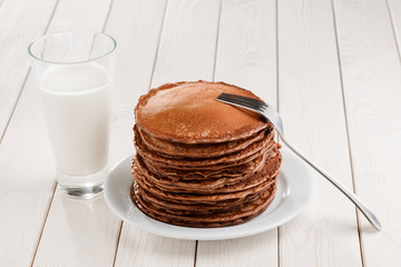 Pile of thick brown pancakes