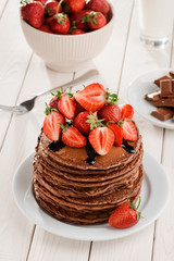 Pancakes with strawberries and chocolate