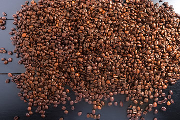 grain coffee on dark wood
