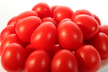 Juicy shiny red tomato group