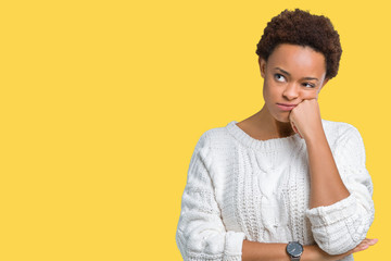 Beautiful young african american woman wearing sweater over isolated background thinking looking tired and bored with depression problems with crossed arms.