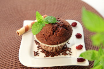 chocolate cupcake decorated on the plate