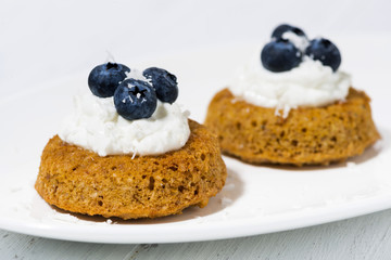 pumpkin cakes with cream and blueberries