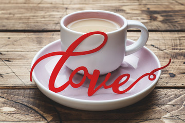Concept Valentine's Day. Coffee Cup on wooden table, Copy space