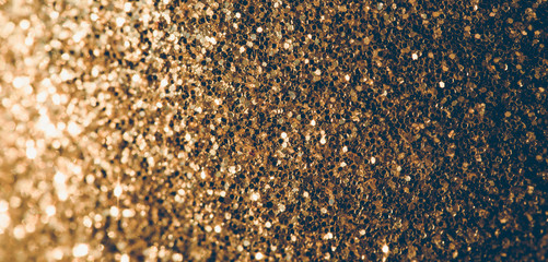 Festive shiny background. Golden glitter