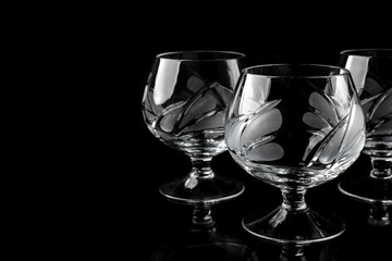 Stemware on black background.