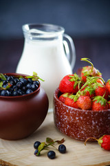 Blueberries and strawberries harvesting dessert
