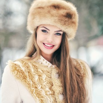 Portrait of a beautiful girl in winter - close up