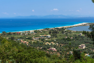 Obraz premium Amazing panorama of Agios Ioanis beach with blue waters, Lefkada, Ionian Islands, Greece