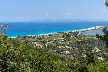 Naklejka na ściany i meble Amazing panorama of Agios Ioanis beach with blue waters, Lefkada, Ionian Islands, Greece