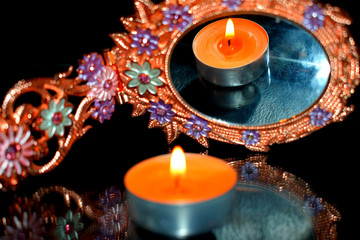 candle with reflection in the mirror