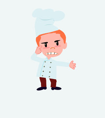 Chef, is angry and points his head with his index finger.