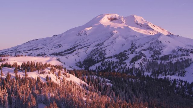 Oregon circa-2018. Aerial view of South Sister Mountain at sunrise. Shot from helicopter with Cineflex gimbal and RED Epic-W camera.