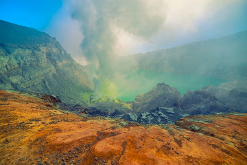 Kawah Ijen volcano crater the famous tourist attraction in the Banyuwangi, East Java island, Indonesia.