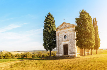 Scenic landscape with old chapel in Tuscany, Italy at autumn