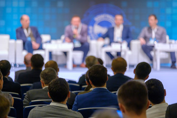 Audience listens to the lecturer at the conference