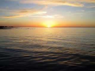 Waves on the lake and sunset