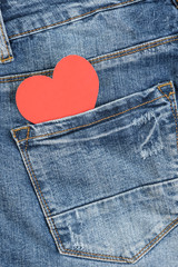Red heart in jeans pocket. Valentines day concept. 