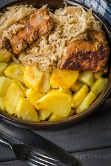 Fried ribs in sauerkraut.