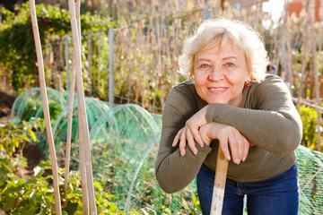 Fototapeta premium Portrait of woman among plants