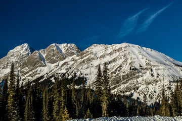 Snow capped mountains and brillant blue skies in Peter Lougheed Provincial Park, Alberta, Canada