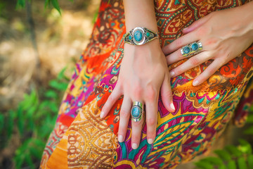 bracelets, necklaces, natural stones from natural stones on the model