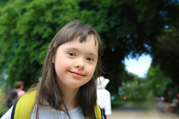 Portrait of little girl smiling in the park