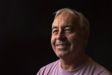 Portrait image of a mature man, with copy space 