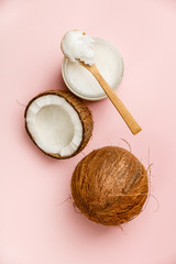 Coconut oil and fresh coconuts, flat lay