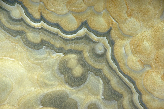 A beautiful background of natural stone, called onix naranja veteado