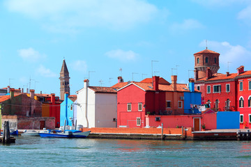 Fototapeta na wymiar colored houses and old bell tower in the island of Burano near Venice in Italy