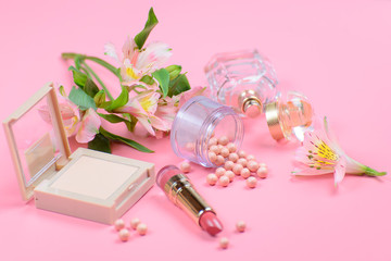 Obraz na płótnie Canvas Cosmetics for makeup on pink background