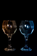 Empty wine glass on a black background