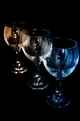 Empty wine glass on a black background