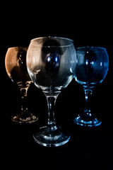 Empty wine glass on a black background