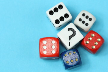 Different dices and question mark.
