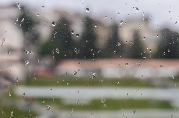 Water drops on window in rainy day