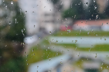 Water drops on window in rainy day