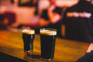 Two glasses of beer.