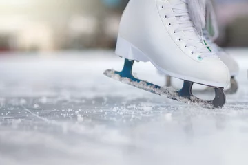 Closeup skating shoes ice skating outdoor at ice rink © petunyia