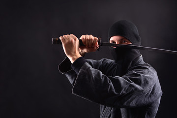 Ninja samurai with katana in attack pose © Dmytro