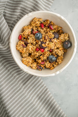 baked granola with fresh blueberries