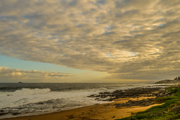 Picturesque and rocky Ballito beach in north Durban , KZN South