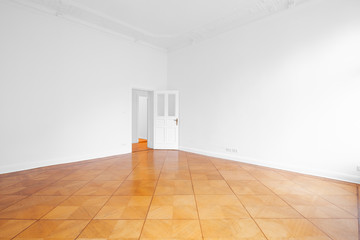 empty room with open door and wooden floor   - new flat old building