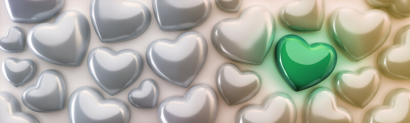 Zielone świecące serce wśród perłowych serc