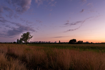 Outskirts. Sunrise outside the city. Out of town.